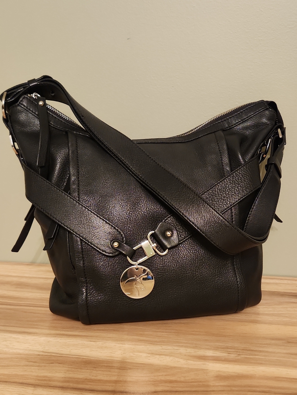 Women's Black Leather Shoulder Bag with Silver Charm